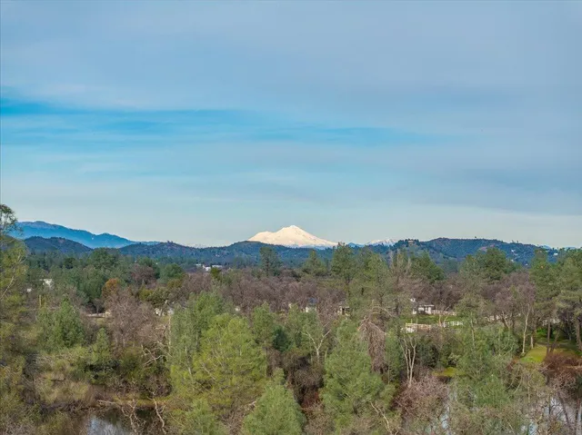 a view of swimming pool with an outdoor space and seating area