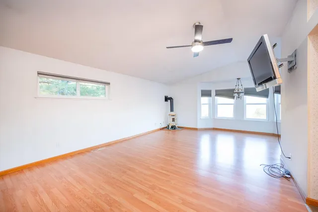 a bathroom with a shower and a sink