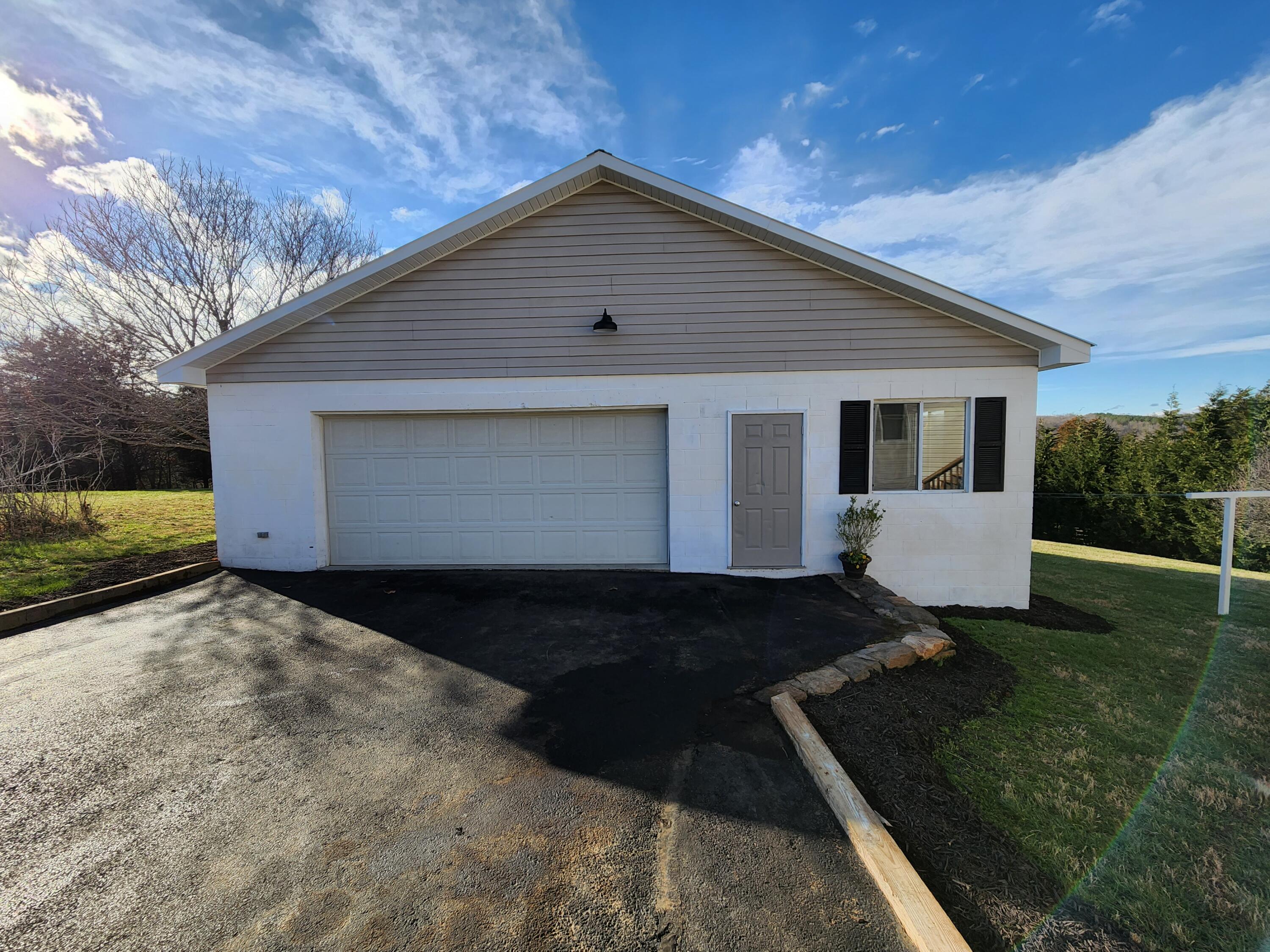 603 Middle Valley Road Hardy, VA 24101 - Photo 5 of 74 a front view of a house with a yard
