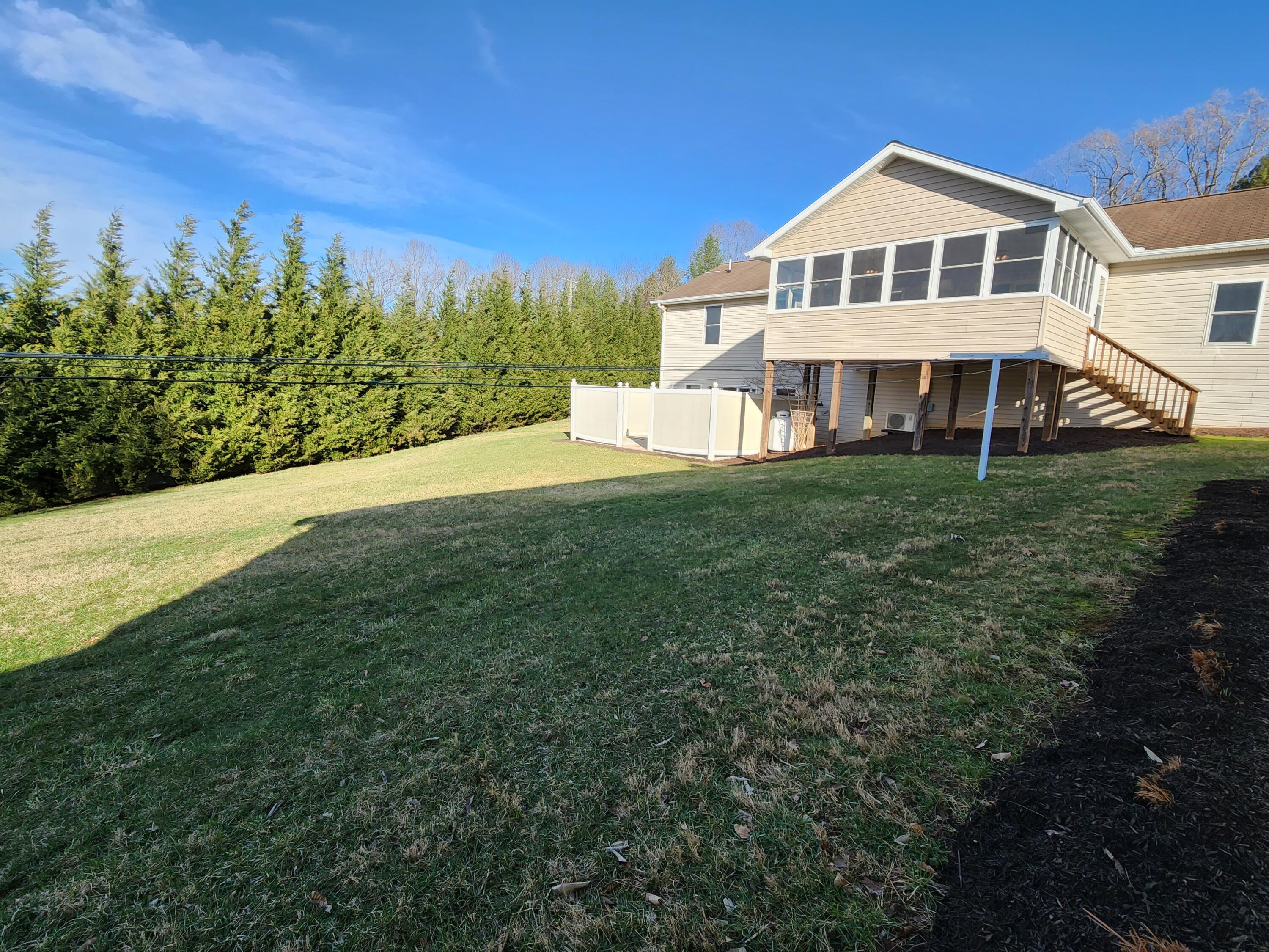 603 Middle Valley Road Hardy, VA 24101 - Photo 8 of 74 a front view of a house with a garden