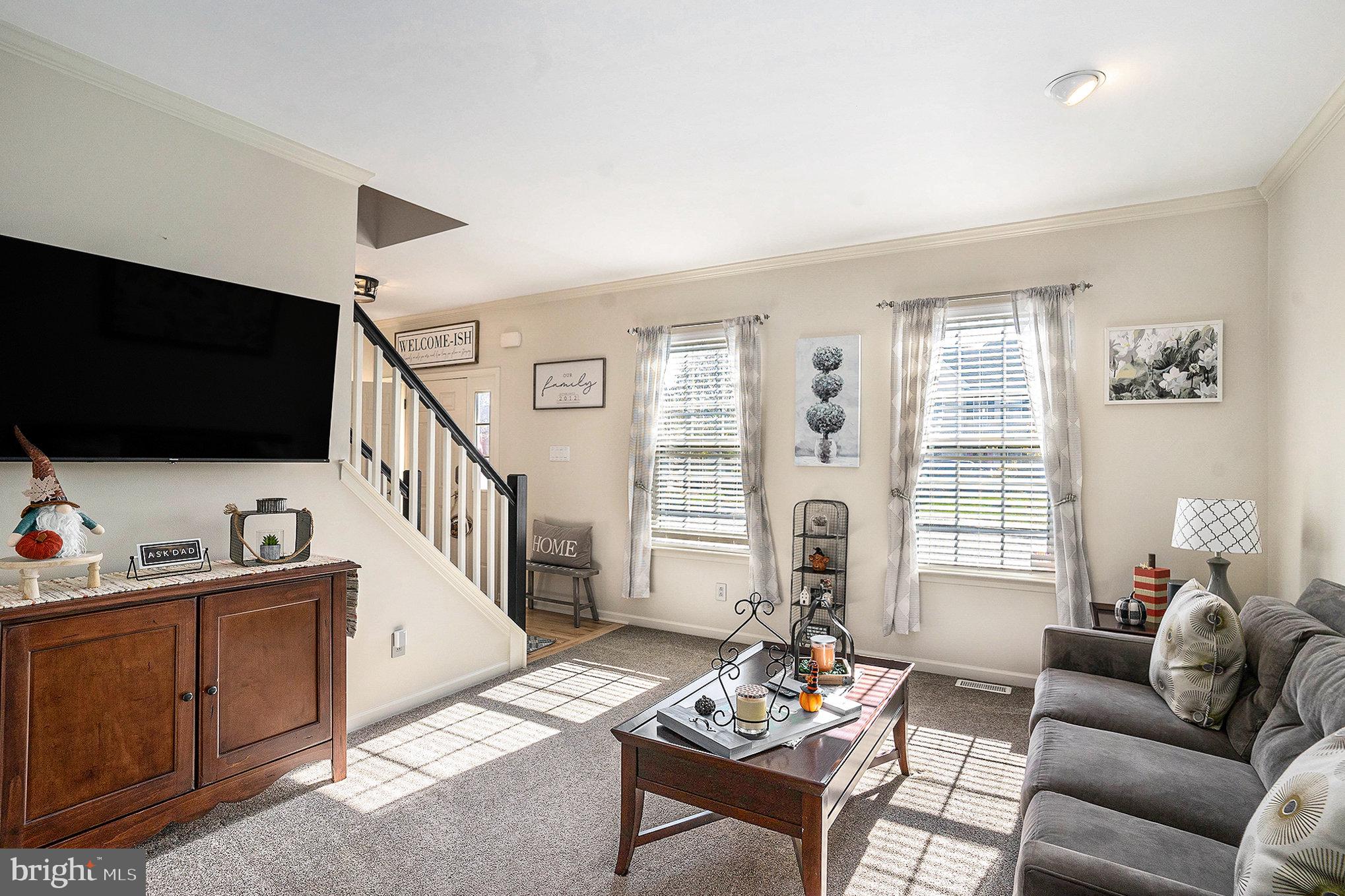 20 Bunker Way Pottstown, PA 19464 - Photo 11 of 45 a living room with furniture and a flat screen tv