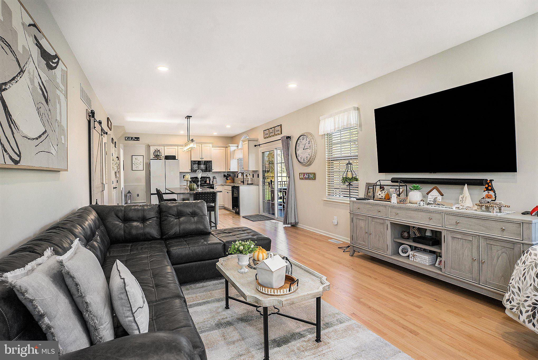 20 Bunker Way Pottstown, PA 19464 - Photo 19 of 45 a living room with furniture and a flat screen tv