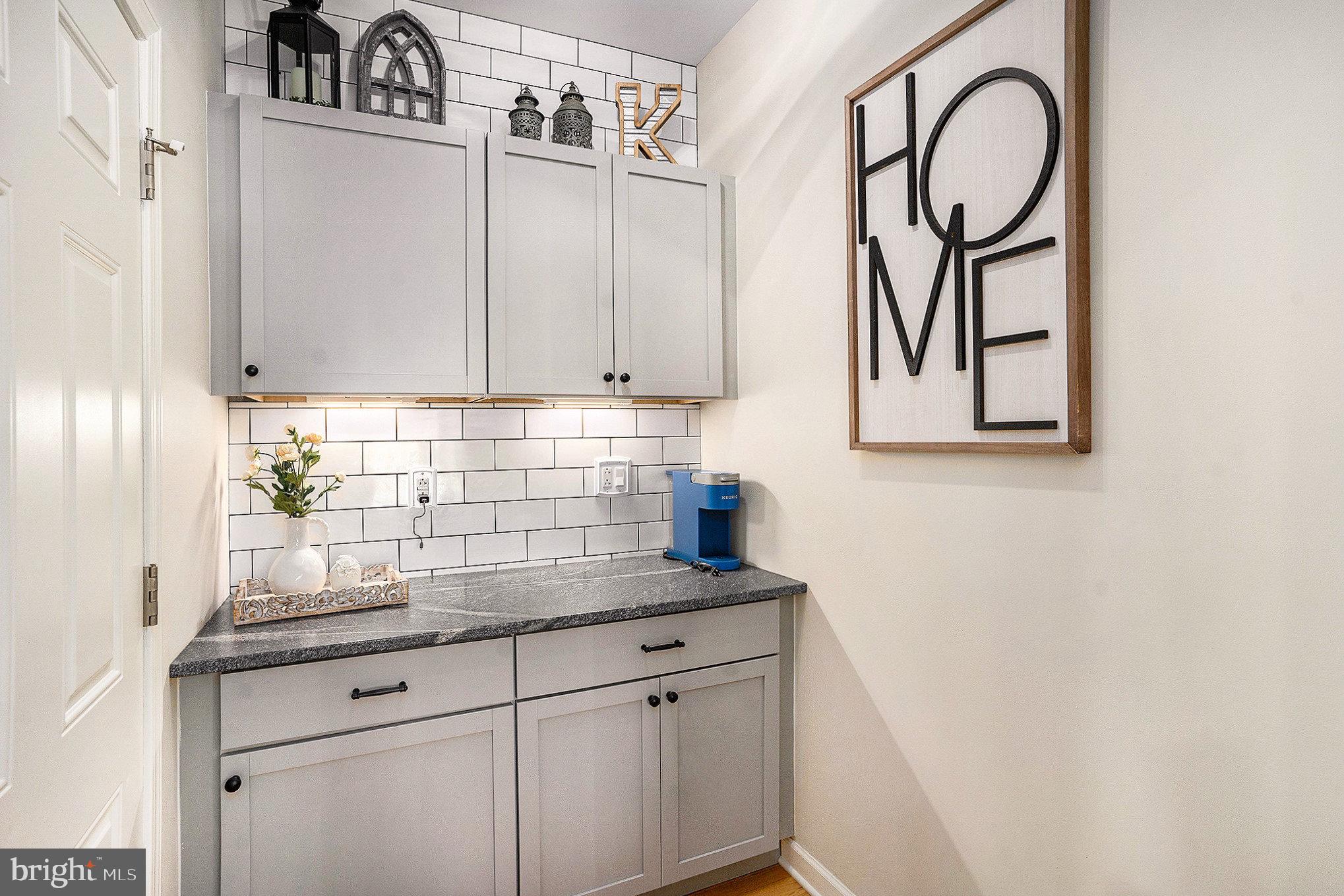 20 Bunker Way Pottstown, PA 19464 - Photo 21 of 45 a kitchen with granite countertop white cabinets and white appliances