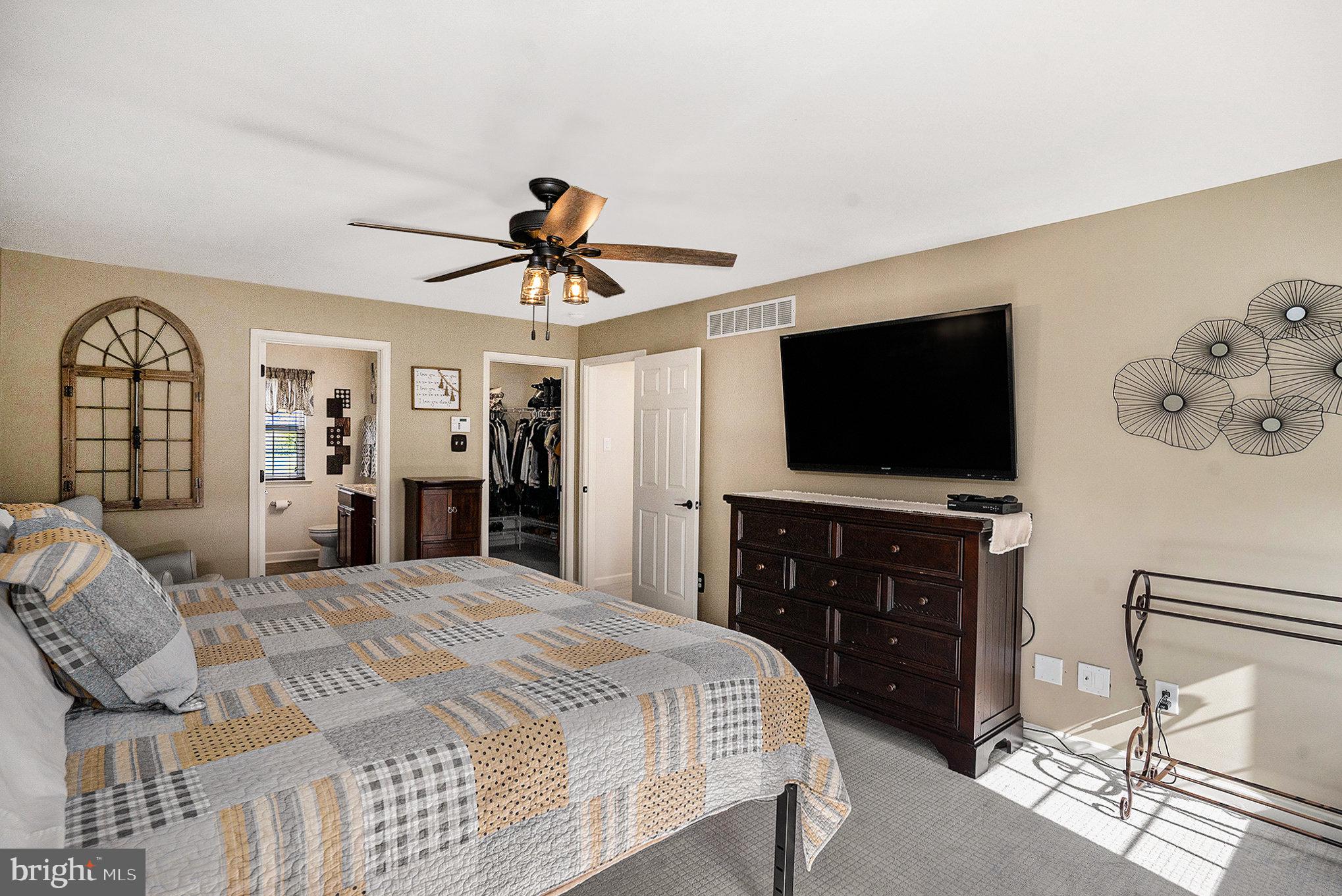20 Bunker Way Pottstown, PA 19464 - Photo 25 of 45 a bedroom with a bed and a flat screen tv