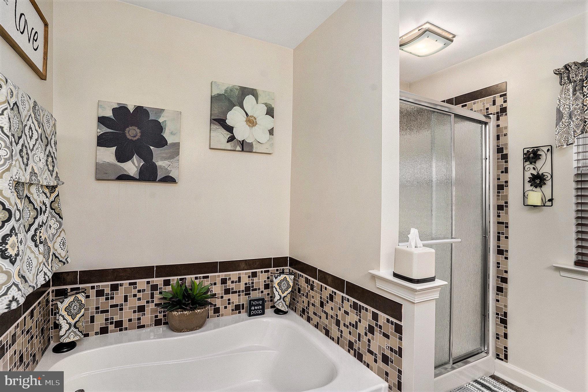 20 Bunker Way Pottstown, PA 19464 - Photo 27 of 45 a bathroom with a bathtub and shower