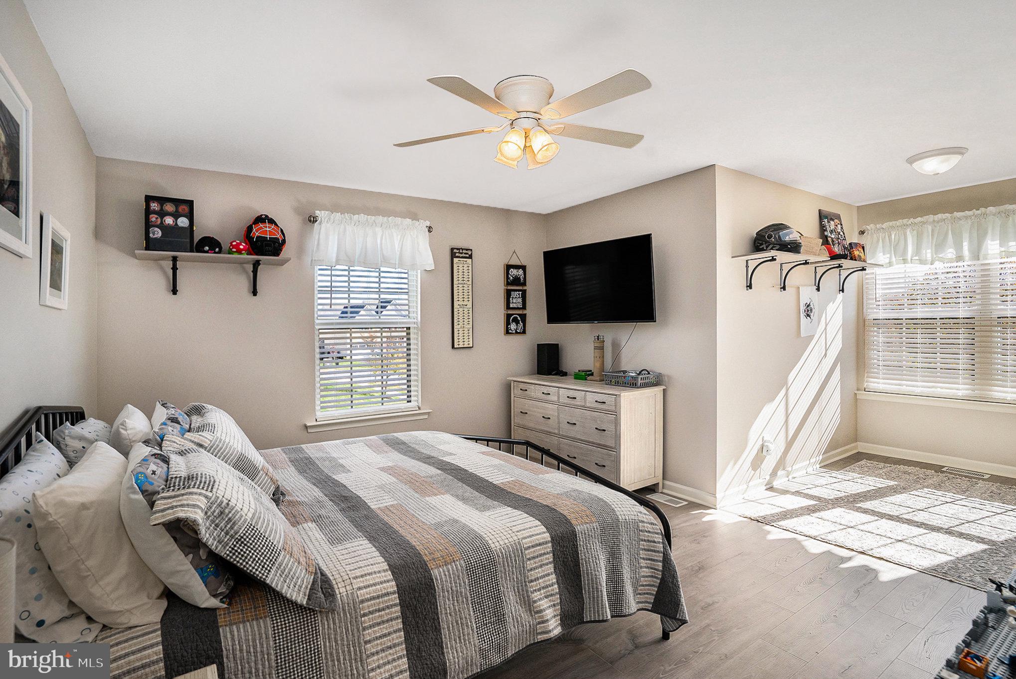 20 Bunker Way Pottstown, PA 19464 - Photo 28 of 45 a bedroom with a bed and a flat screen tv