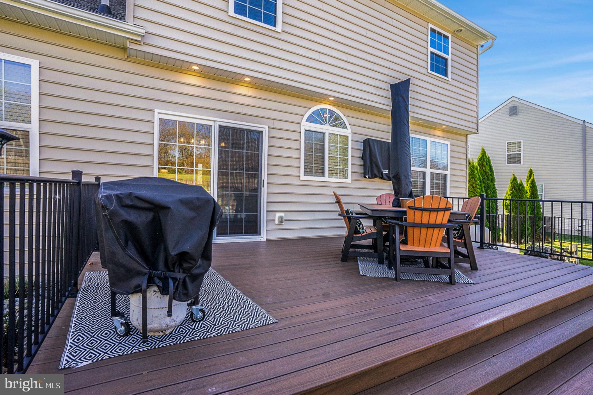 20 Bunker Way Pottstown, PA 19464 - Photo 35 of 45 a view of a deck with table and chairs and wooden floor