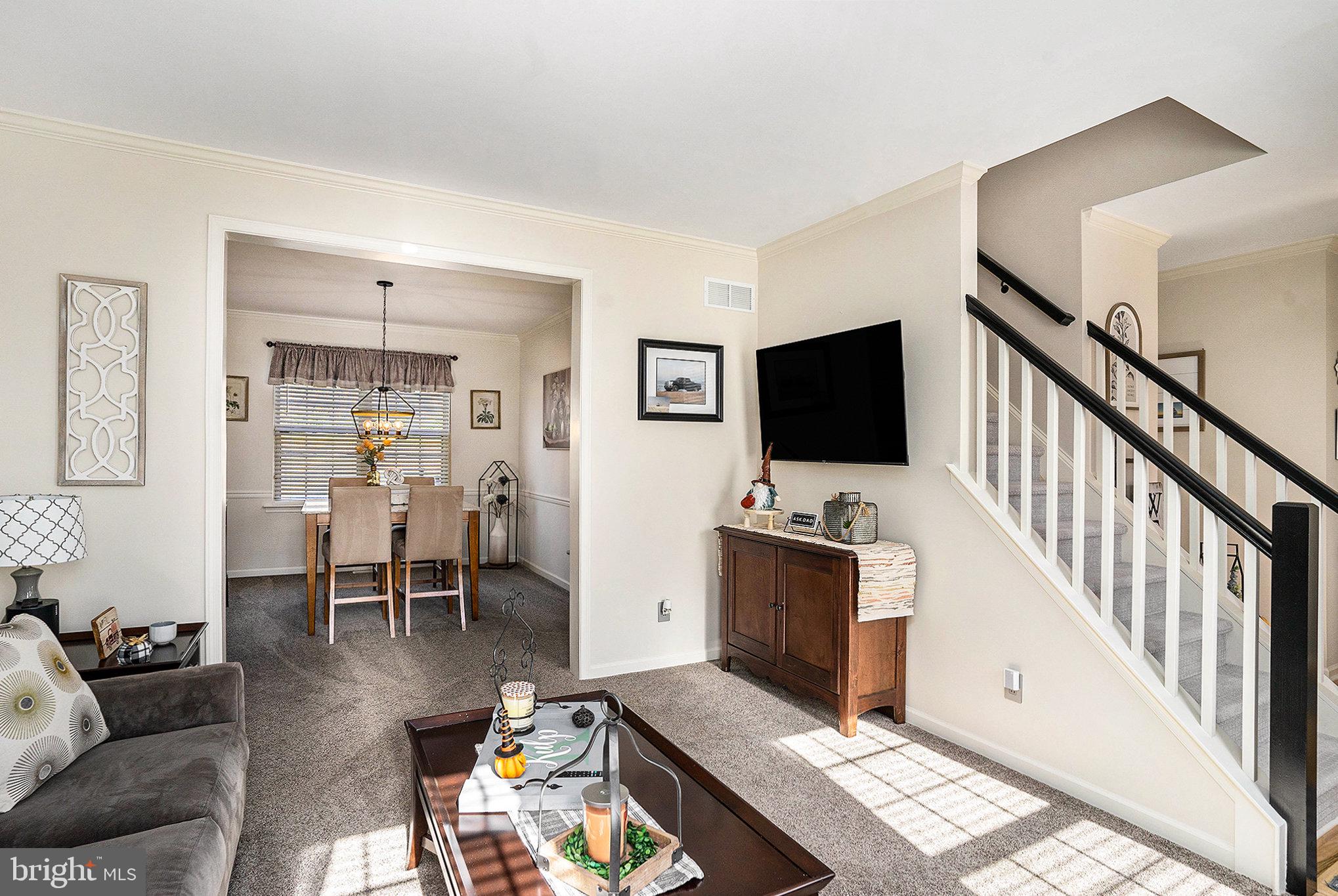 20 Bunker Way Pottstown, PA 19464 - Photo 9 of 45 a living room with furniture and a flat screen tv