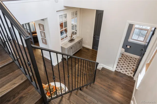 a view of entryway with stairs and wooden floor