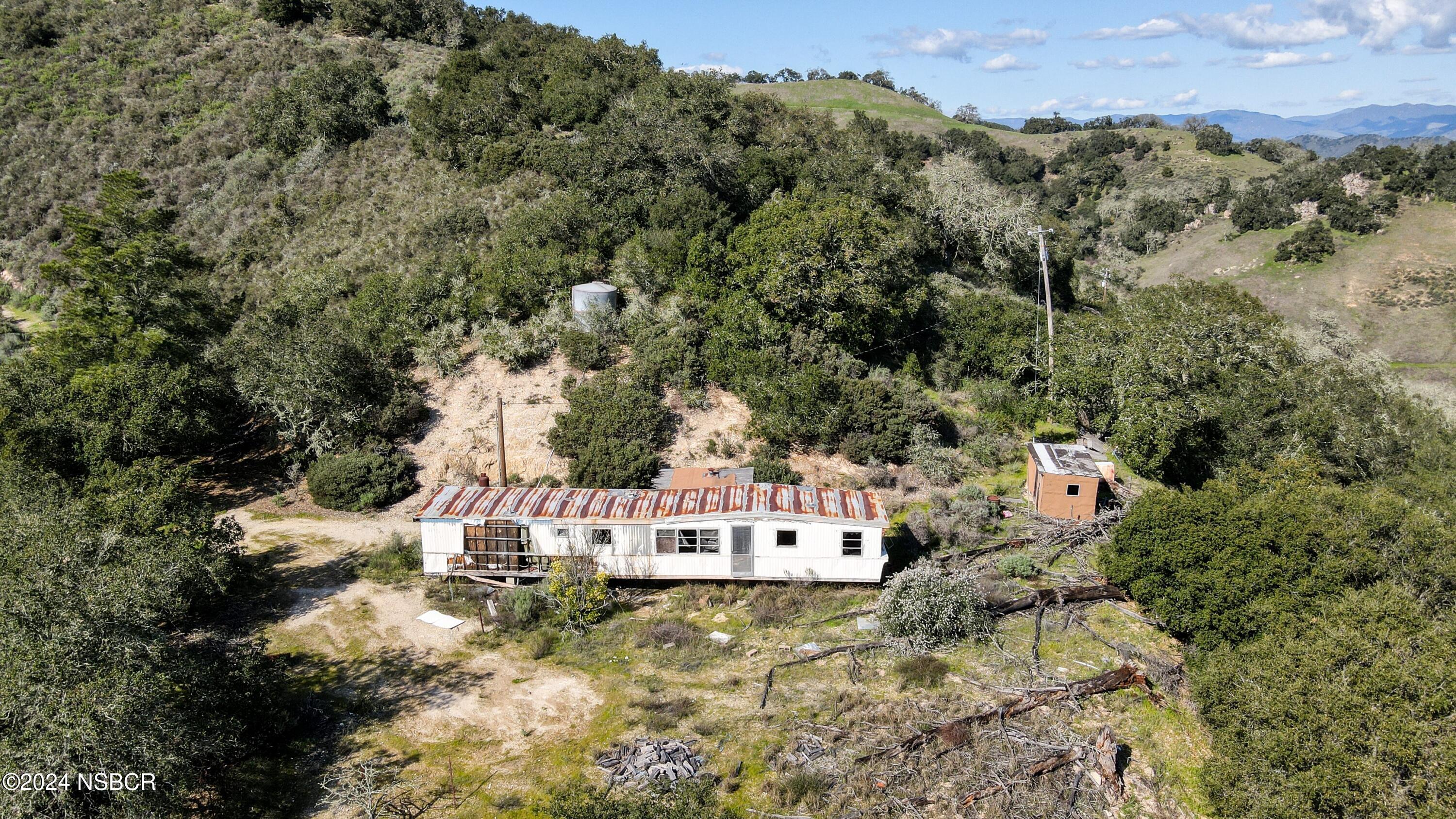 9339 Temettate Drive Santa Maria, CA 93454 - Photo 24 of 41 an aerial view of residential houses with outdoor space and trees