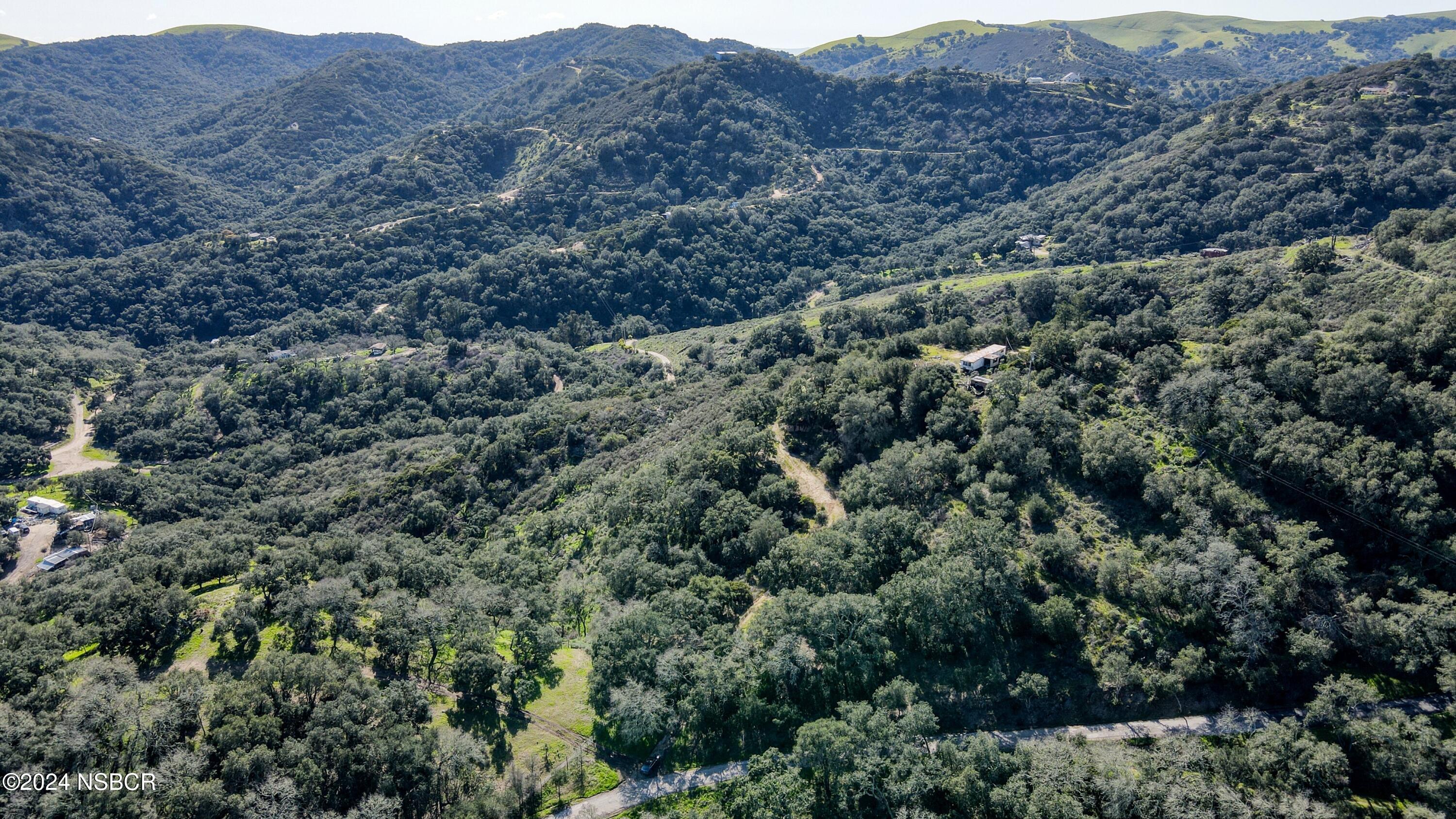 9339 Temettate Drive Santa Maria, CA 93454 - Photo 28 of 41 an aerial view of residential house and green valley