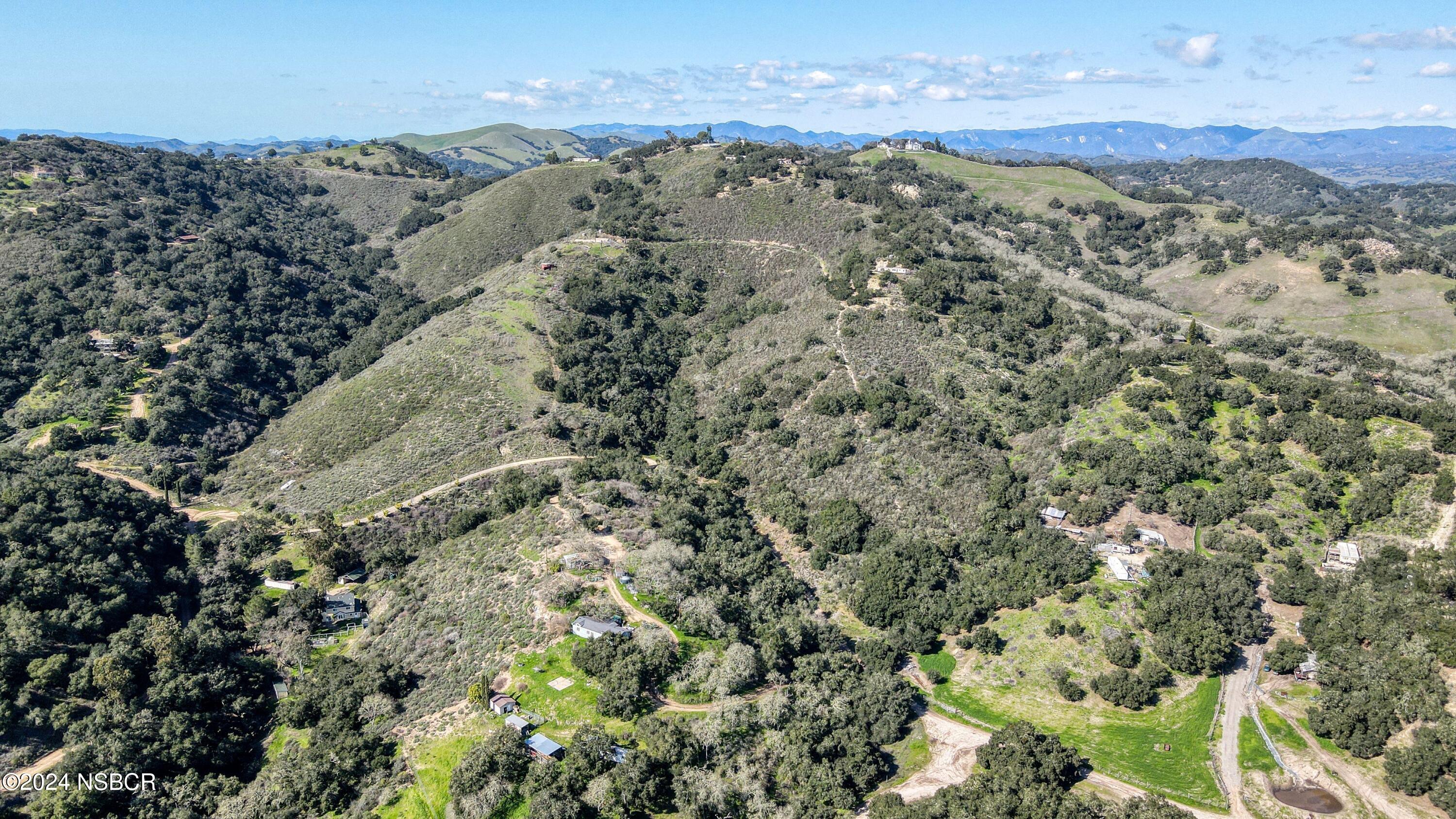 9339 Temettate Drive Santa Maria, CA 93454 - Photo 3 of 41 a view of a city with mountains in the background