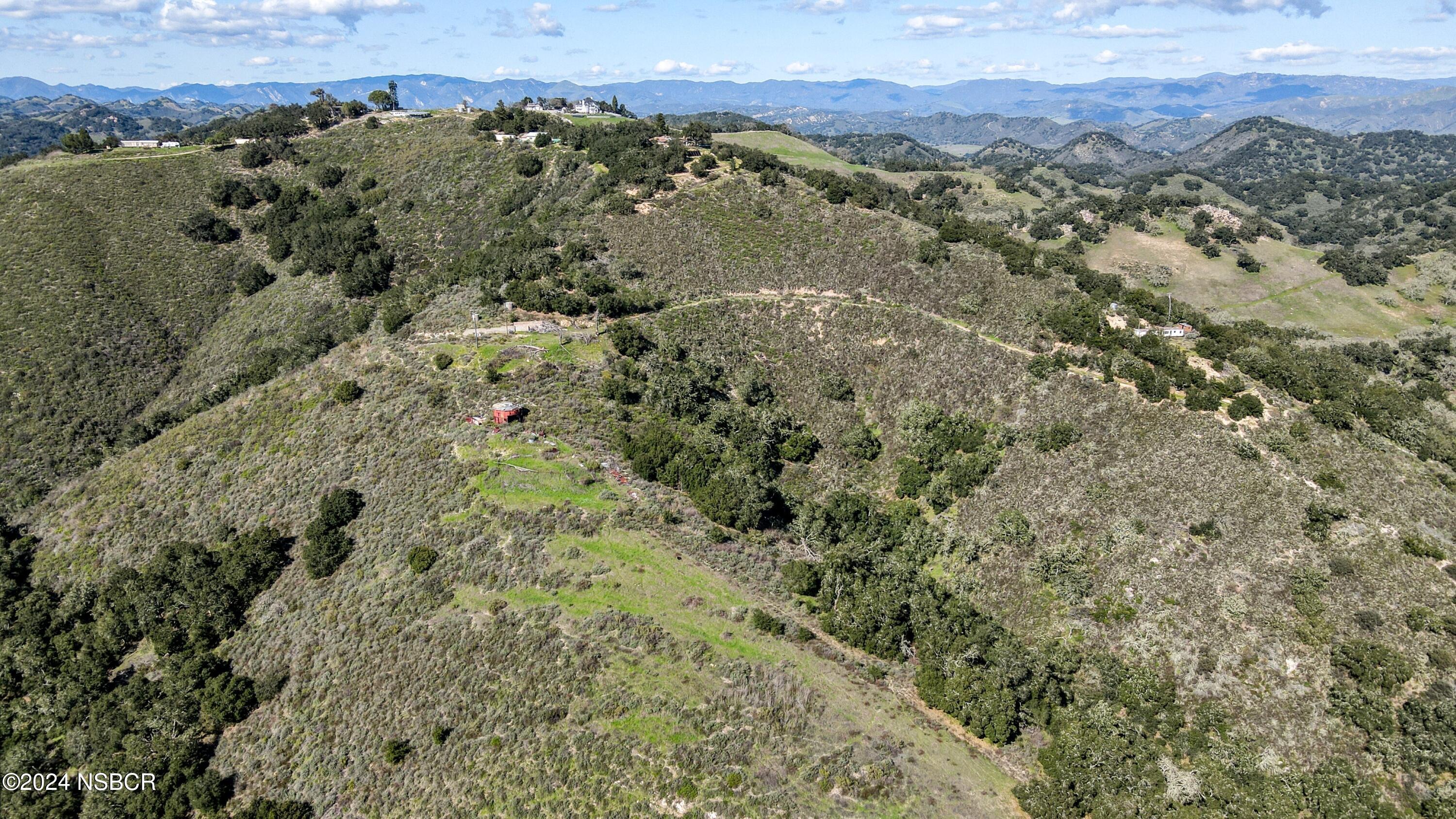 9339 Temettate Drive Santa Maria, CA 93454 - Photo 39 of 41 a view of a city with lush green forest
