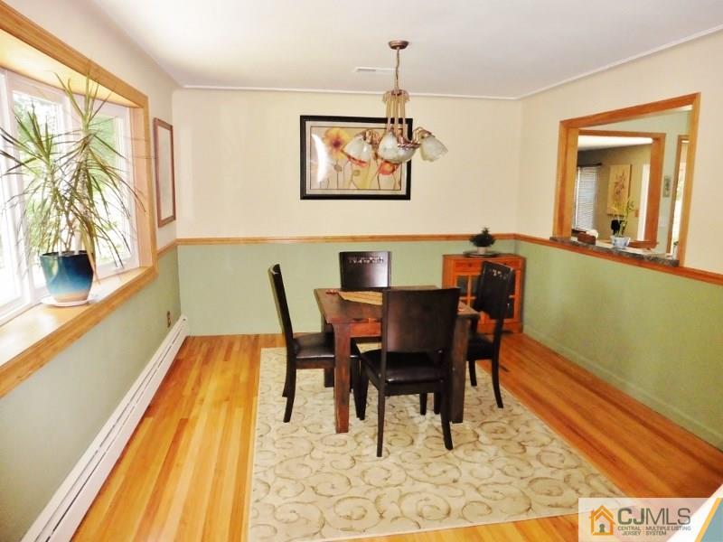 103 Wilson Road Somerset, NJ 08873 - Photo 5 of 14 a view of a dining room with furniture and a window