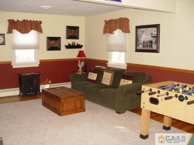 103 Wilson Road Somerset, NJ 08873 - Photo 6 of 14 a living room with furniture and wooden floor