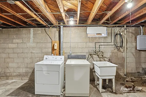 a utility room with dryer and washer