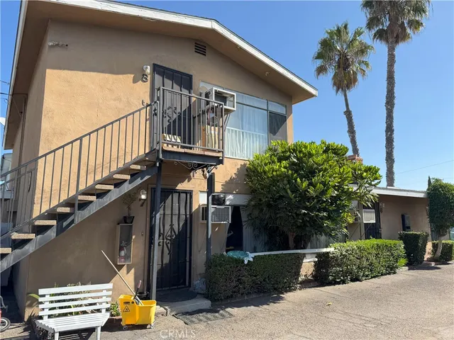 a view of a house with a street