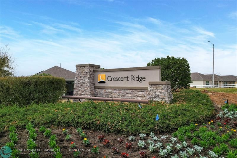 9857 Southwest 99th Loop Ocala, FL 34481 - Photo 30 of 45 a view of a sign board with a big yard