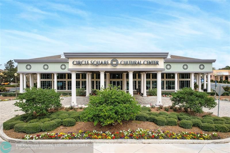 9857 Southwest 99th Loop Ocala, FL 34481 - Photo 43 of 45 front view of a building with a garden