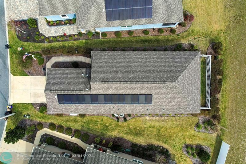 9857 Southwest 99th Loop Ocala, FL 34481 - Photo 7 of 45 a view of house with outdoor space