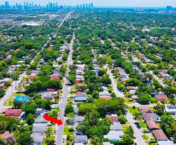 270 Northeast 162nd Street, Unit B Miami, FL 33162 - Photo 2 of 7 a view of a city