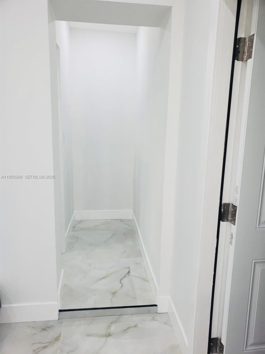 270 Northeast 162nd Street, Unit B Miami, FL 33162 - Photo 6 of 7 a view of closet