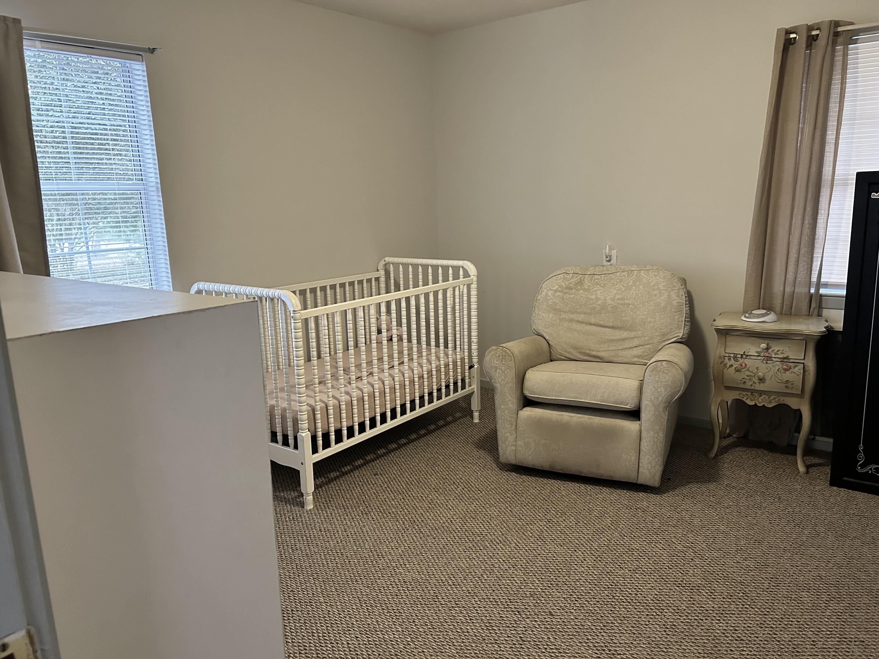 1764 Adams Road DeFuniak Springs, FL 32433 - Photo 20 of 30 a room with furniture and a window