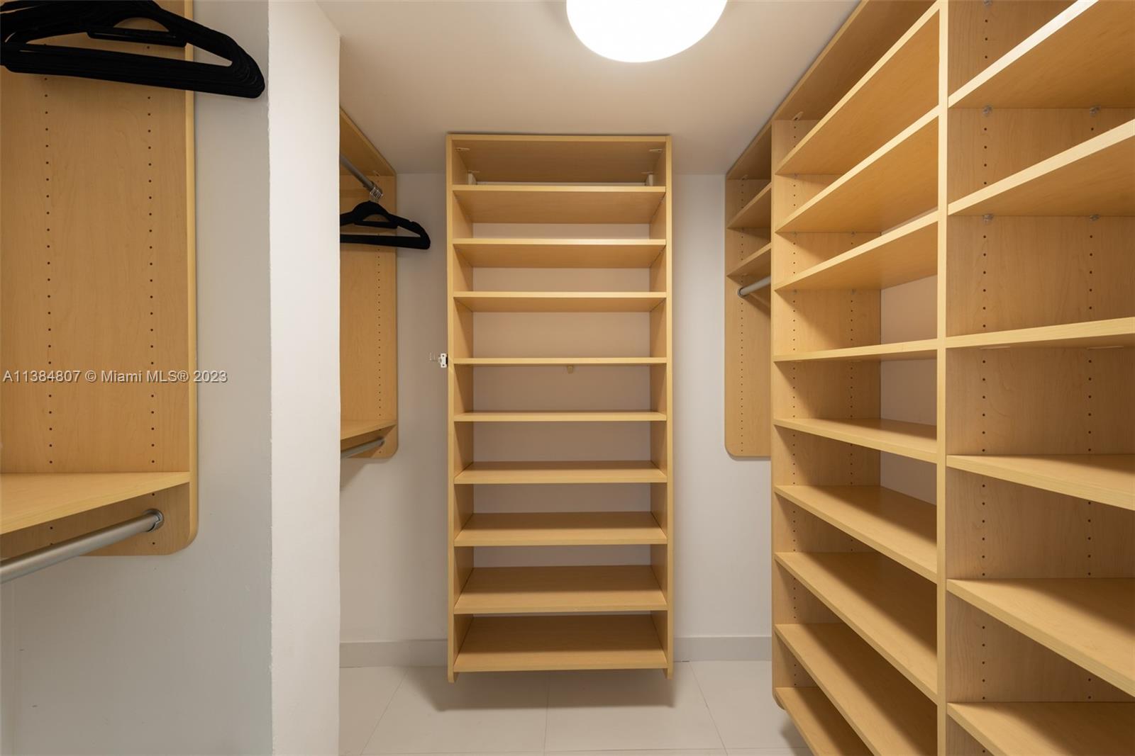 121 Crandon Boulevard, Unit 463 Key Biscayne, FL 33149 - Photo 14 of 18 a view of walk in closet with empty racks