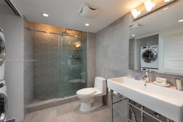 a bedroom with a bed and lamp