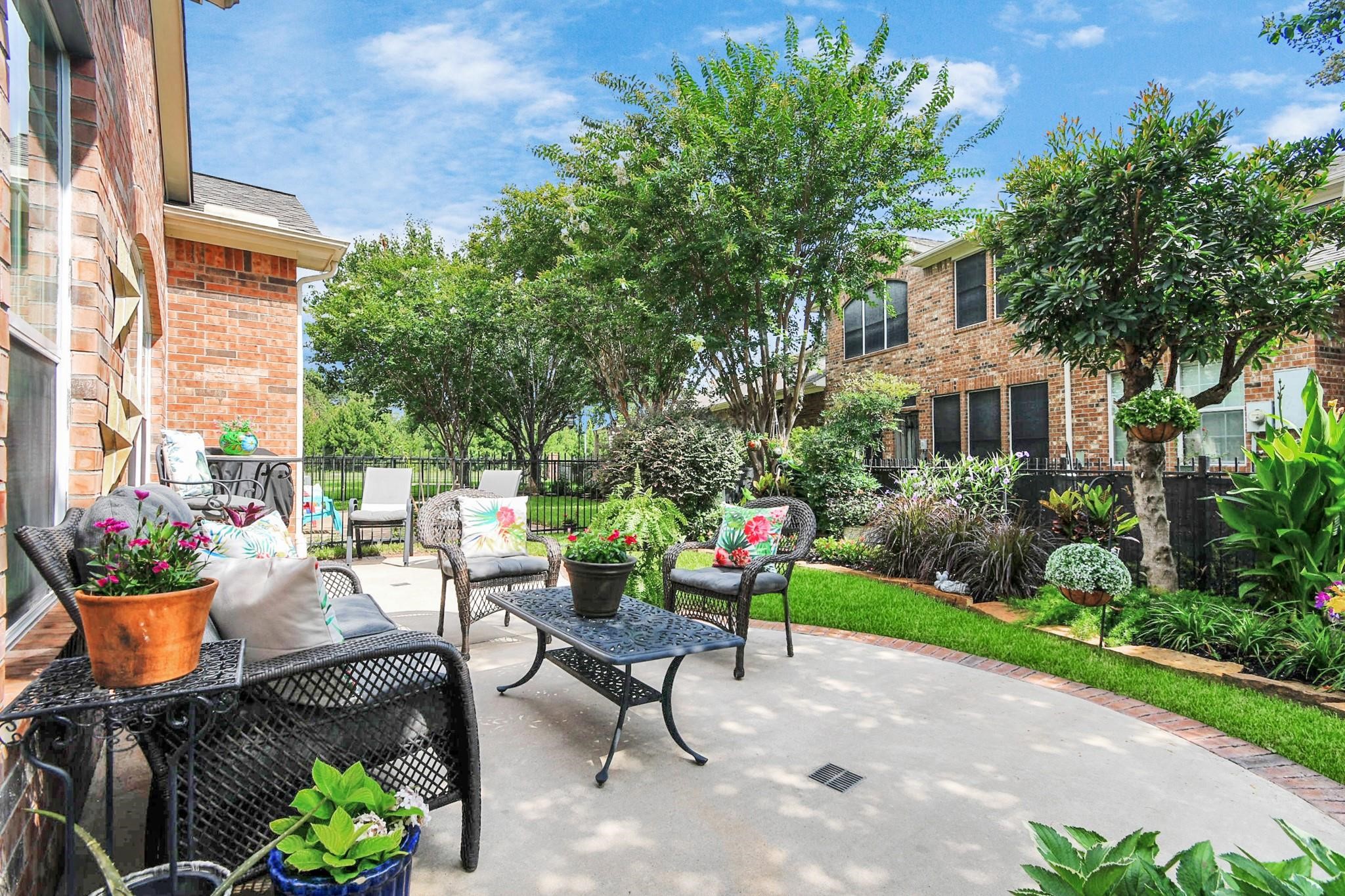 8624 Sunset Loch Drive Spring, TX 77379 - Photo 33 of 44 a view of a chairs and table in a patio