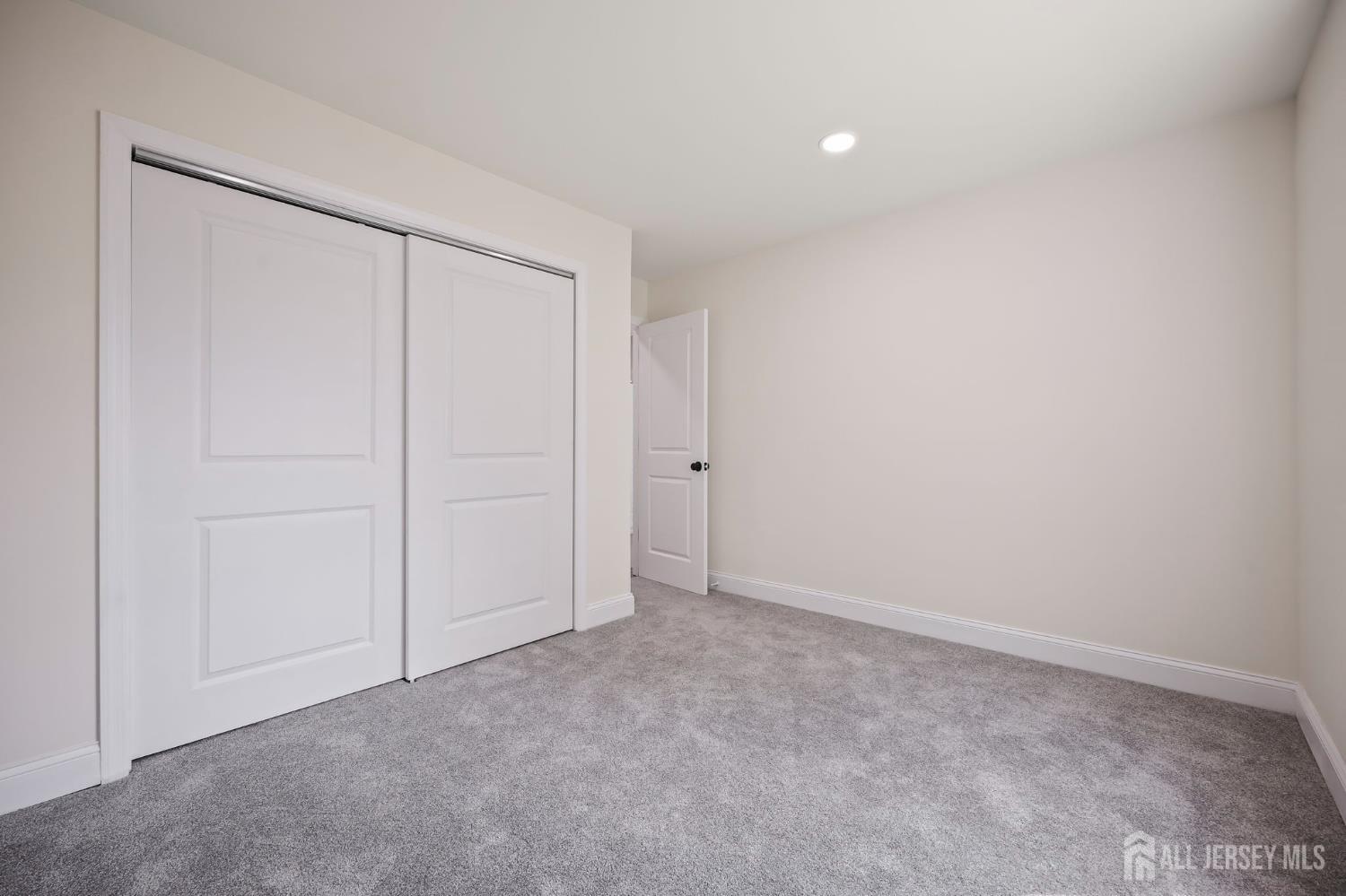 12 Dillon Road Kendall Park, NJ 08824 - Photo 25 of 48 a view of an empty room