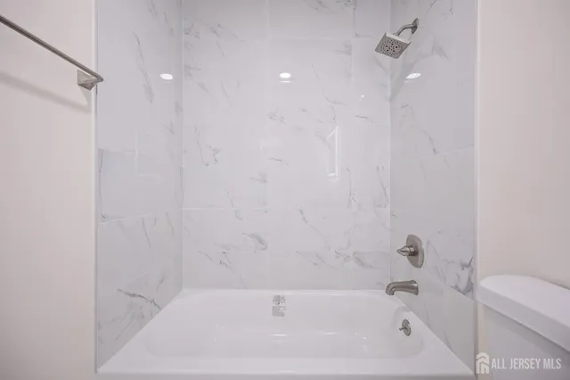 a bathroom with a bathtub