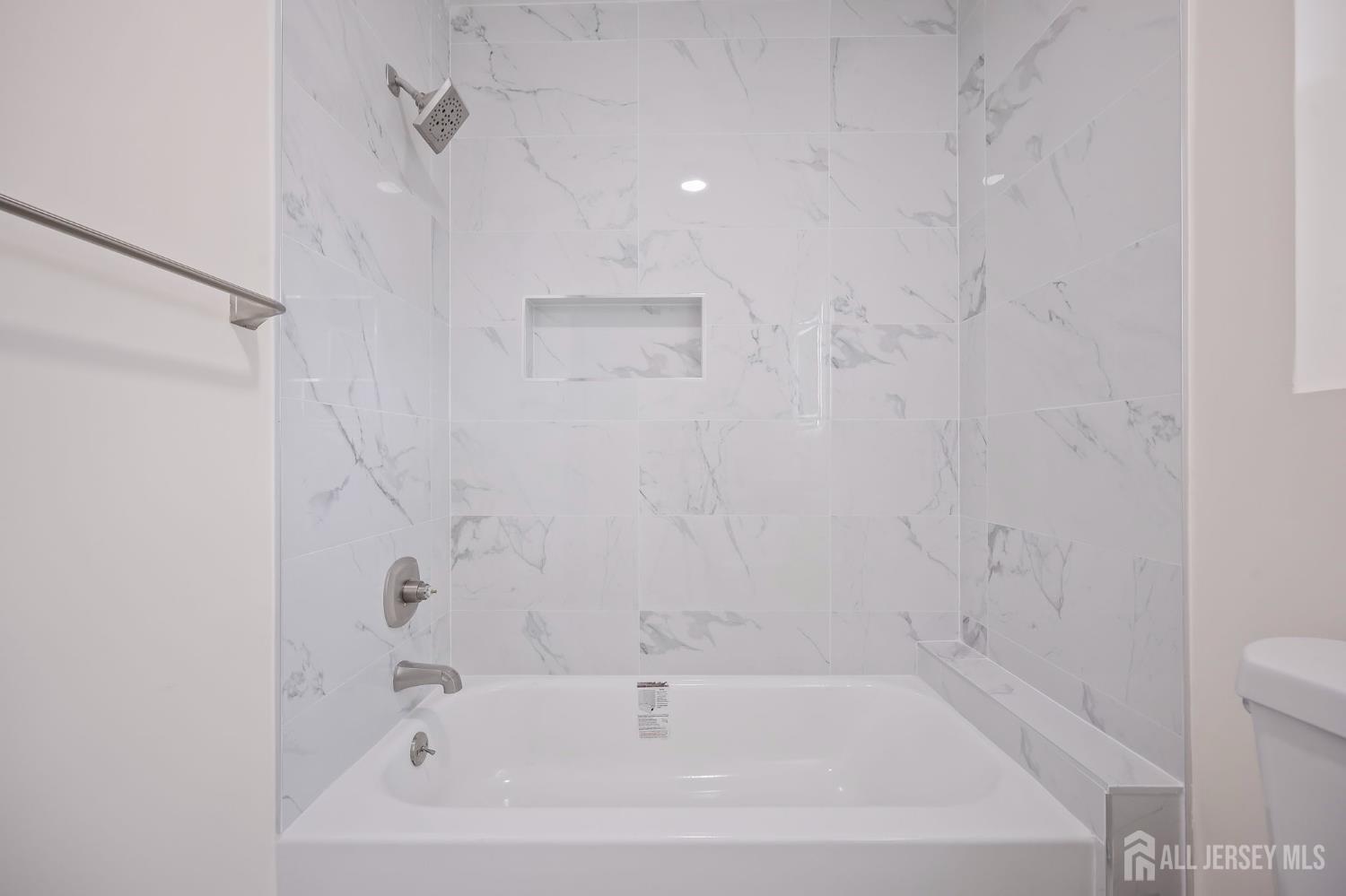 12 Dillon Road Kendall Park, NJ 08824 - Photo 32 of 48 a bathroom with a bathtub