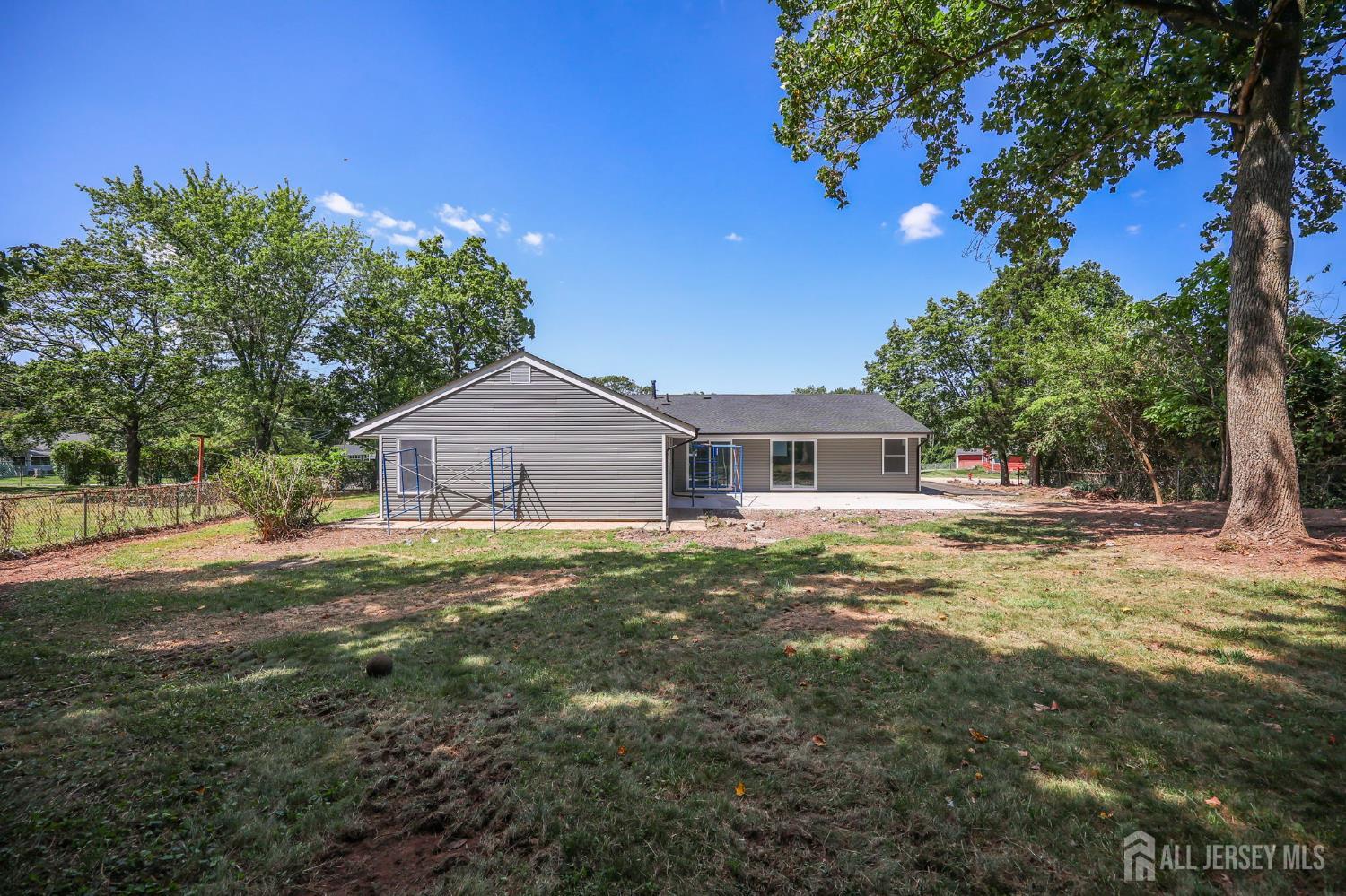12 Dillon Road Kendall Park, NJ 08824 - Photo 41 of 48 a house view with a outdoor space