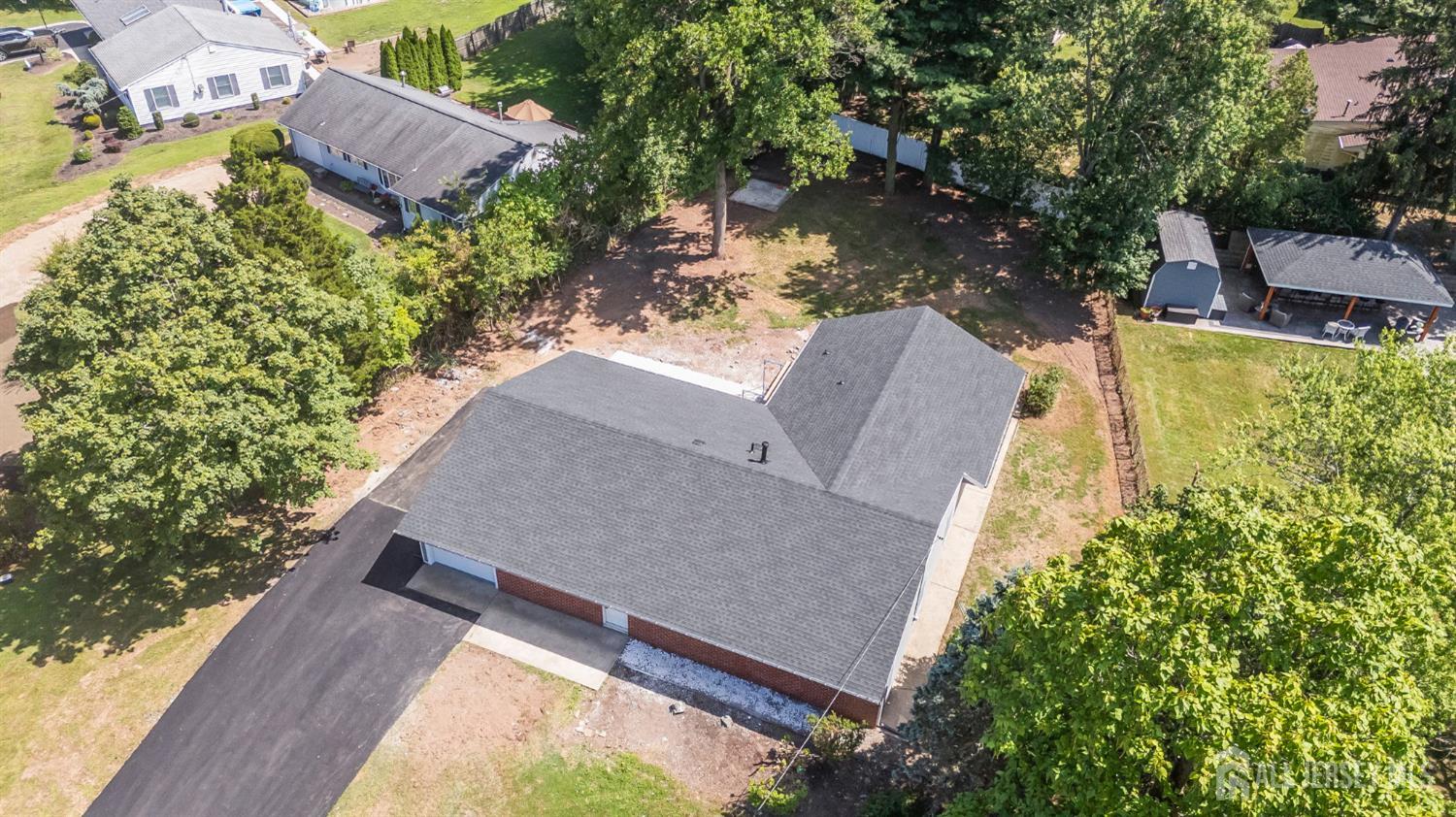 12 Dillon Road Kendall Park, NJ 08824 - Photo 45 of 48 an aerial view of a house with outdoor space