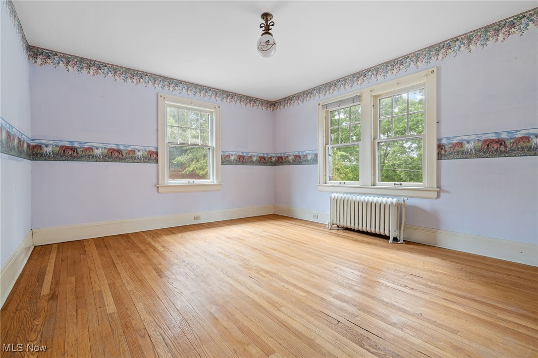 1271 Circle Drive Akron, OH 44310 - Photo 17 of 45 Bedroom 1 with light wood-style flooring & plenty of light.