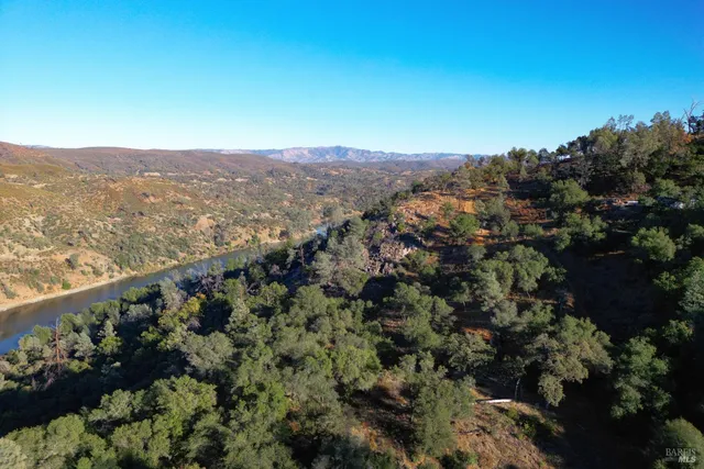 a view of a city with mountains in the background