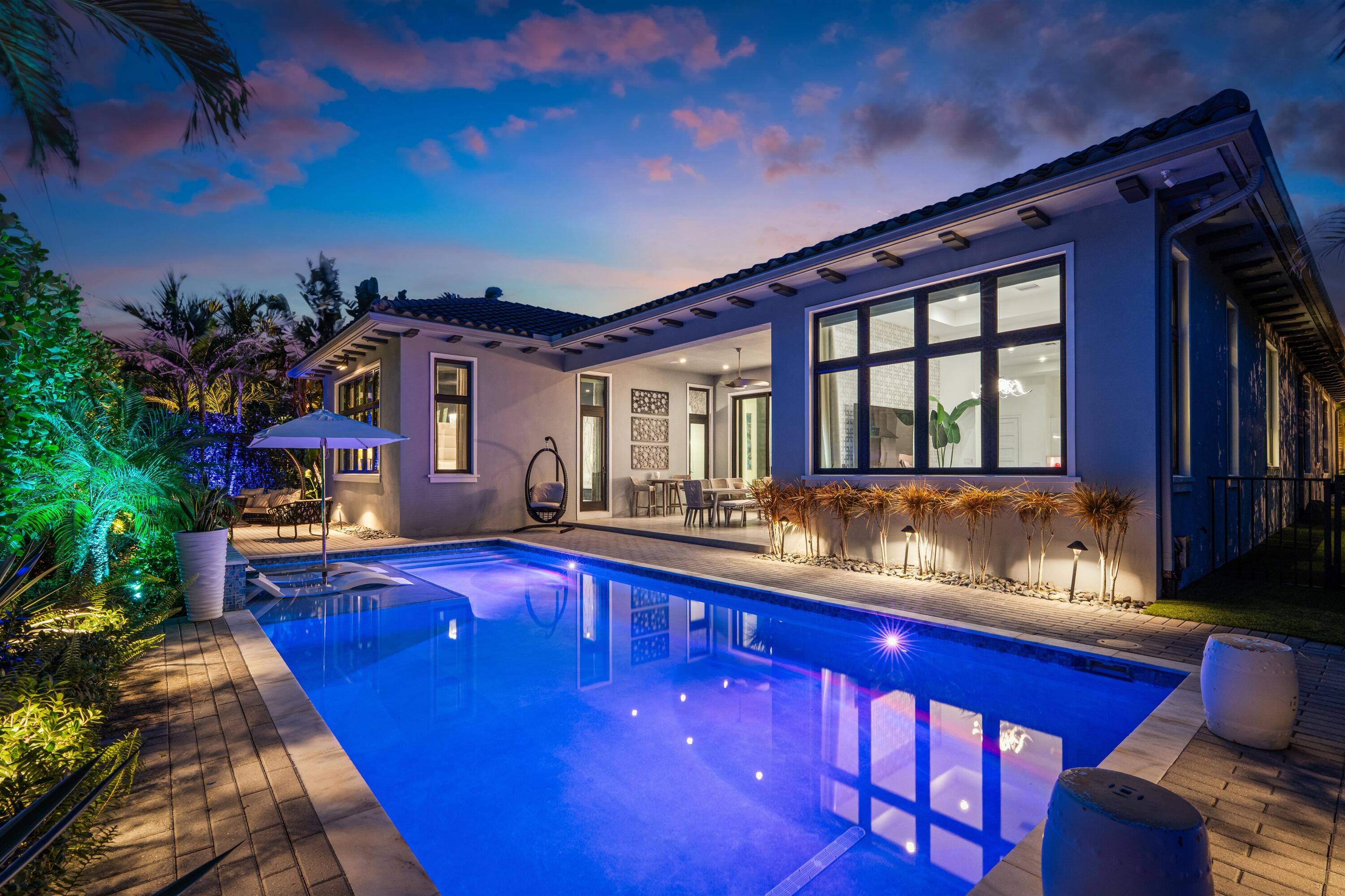 904 Northwest 2nd Street Boca Raton, FL 33486 - Photo 41 of 41 POOL_TO_REAR_ANGLE_TWILIGHT