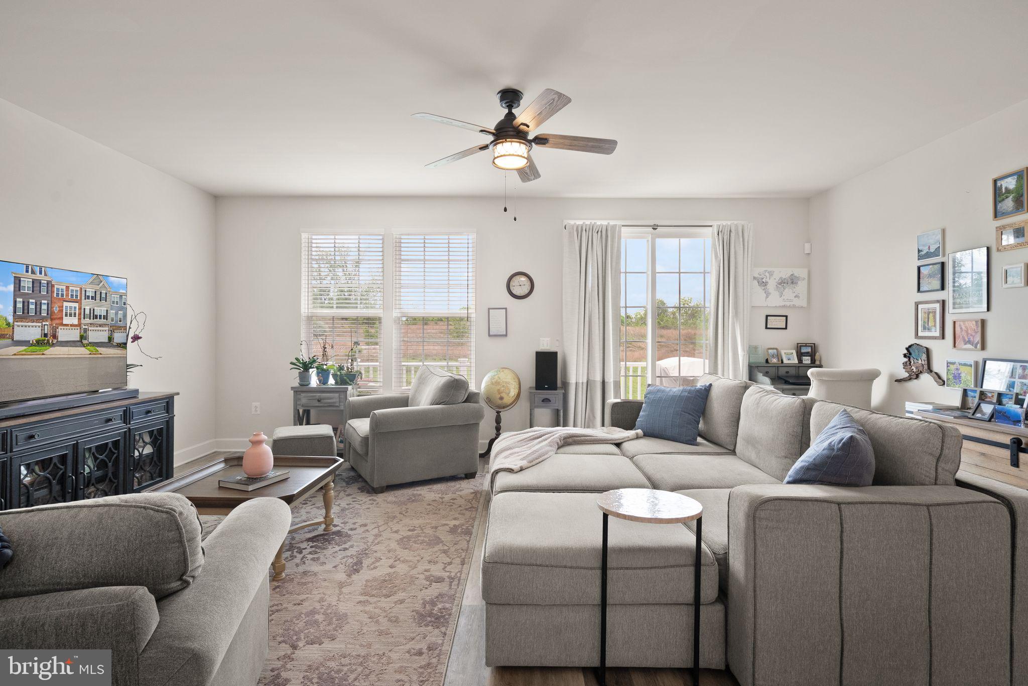 13803 Litespeed Way Gainesville, VA 20155 - Photo 13 of 37 a living room with furniture and a large window