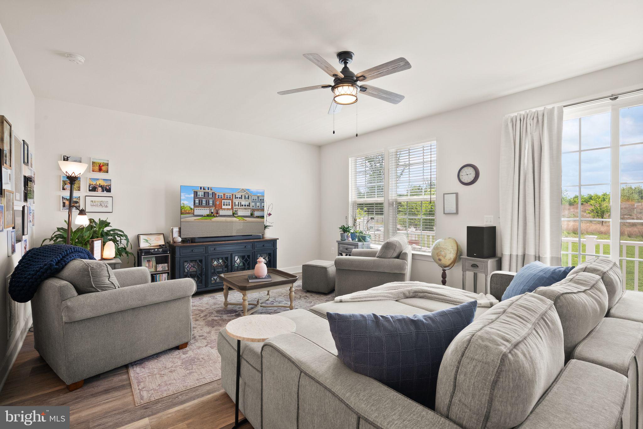 13803 Litespeed Way Gainesville, VA 20155 - Photo 14 of 37 a living room with furniture and a large window
