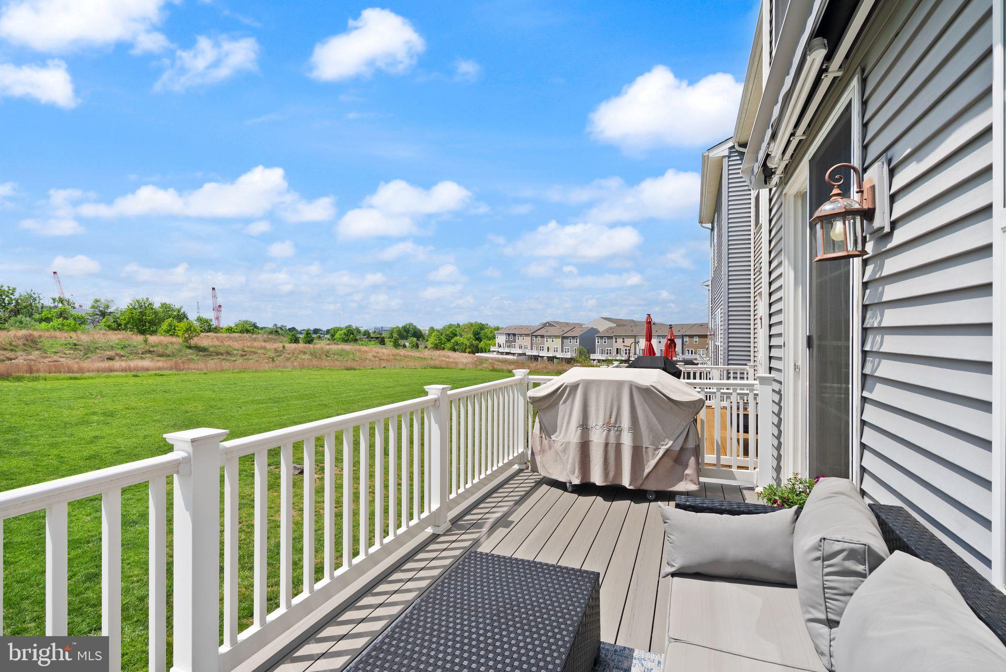 13803 Litespeed Way Gainesville, VA 20155 - Photo 15 of 37 a view of a balcony with furniture