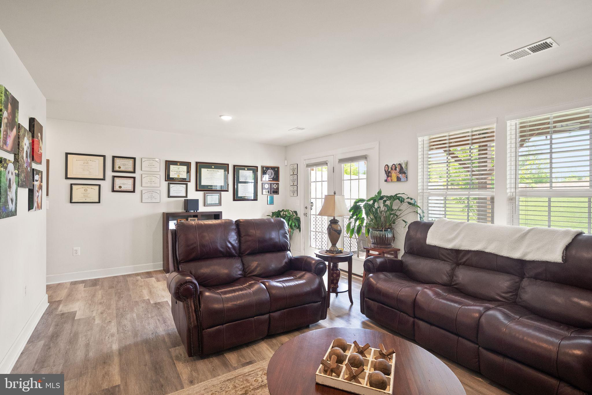 13803 Litespeed Way Gainesville, VA 20155 - Photo 31 of 37 a living room with furniture and a window
