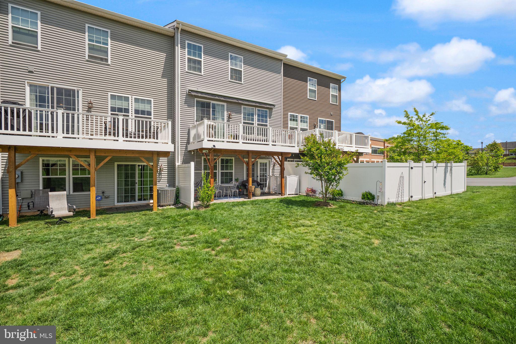13803 Litespeed Way Gainesville, VA 20155 - Photo 35 of 37 a view of a house with backyard and garden