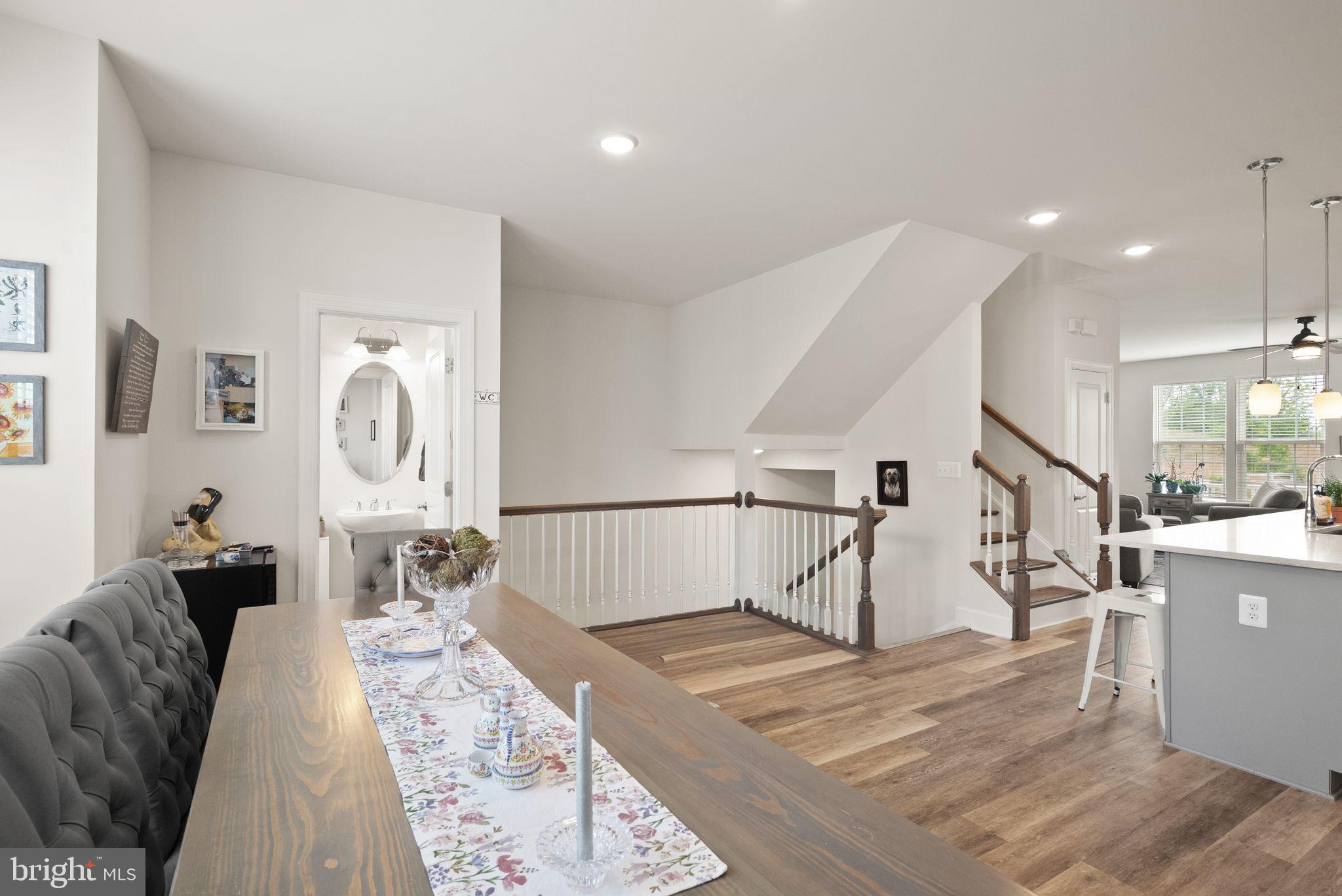 13803 Litespeed Way Gainesville, VA 20155 - Photo 5 of 37 a living room with furniture and wooden floors