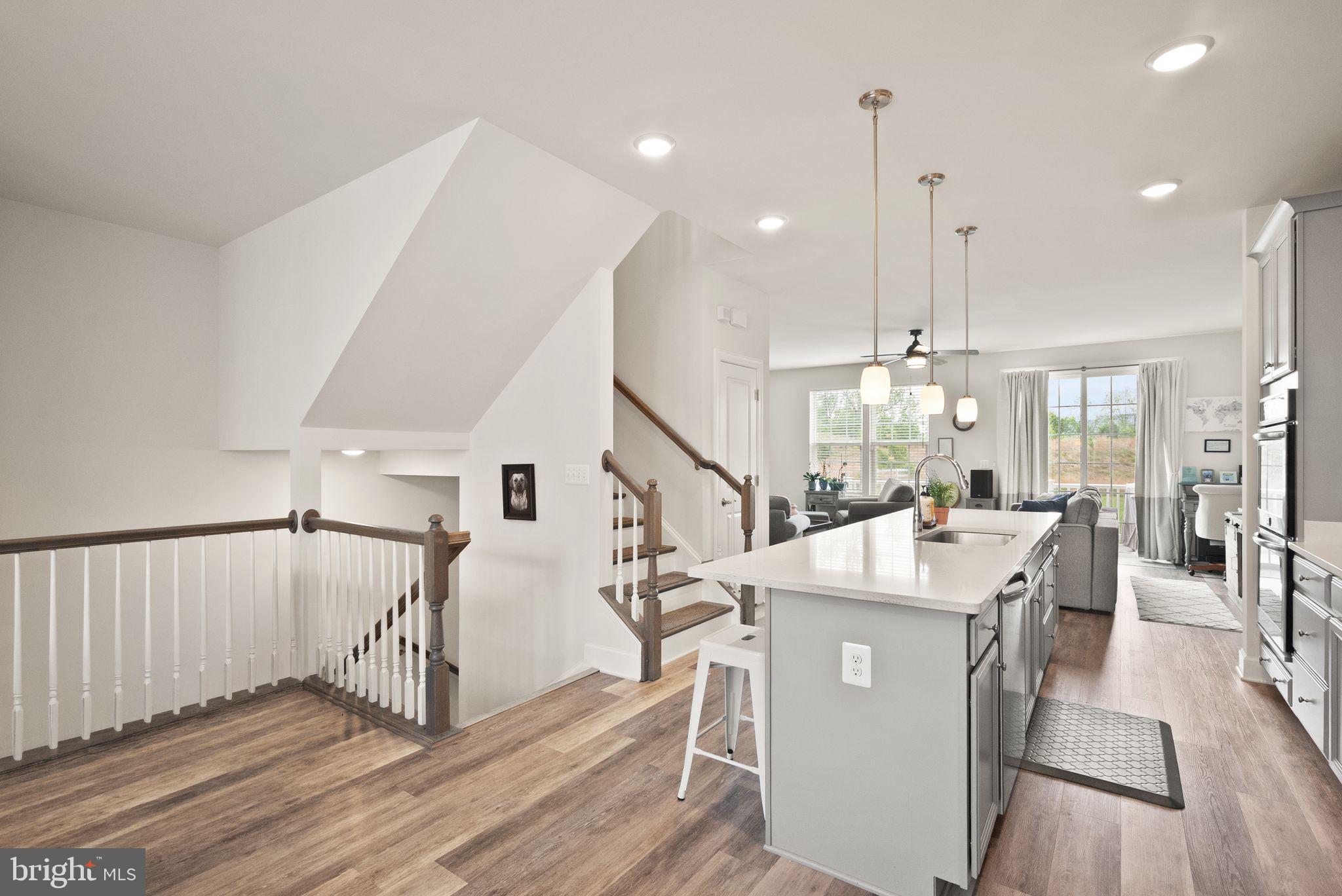 13803 Litespeed Way Gainesville, VA 20155 - Photo 6 of 37 a very nice looking dining room with a table and chairs
