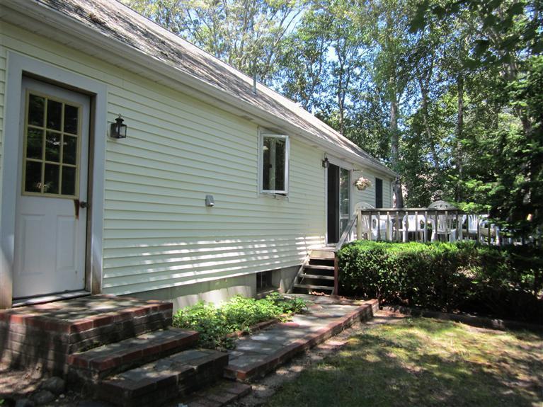 7 Ruth Lane Harwich, MA 02645 - Photo 3 of 14 a view of a house with a yard