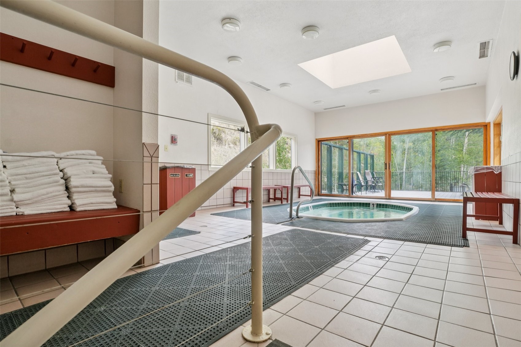 22097 Saints John Road, Unit 2506 Keystone, CO 80435 - Photo 45 of 47 View of pool featuring a sunroom, a skylight, a swimming pool, and an in-ground hot tub