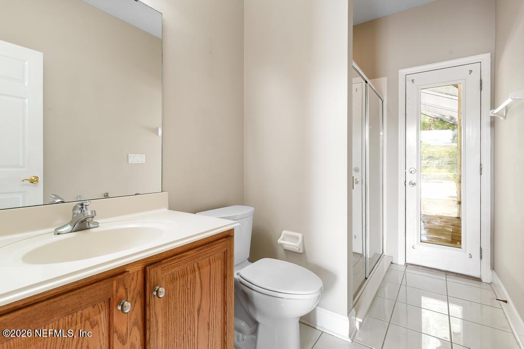 337 South Mill View Way Ponte Vedra Beach, FL 32082 - Photo 26 of 55 a bathroom with a sink toilet and vanity