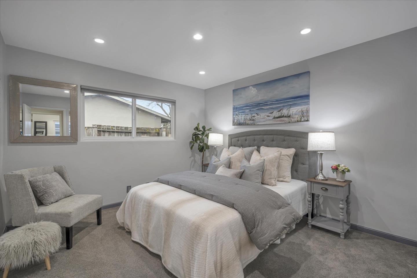 1867 Queens Road Concord, CA 94519 - Photo 18 of 30 a bedroom with a large bed and a couch