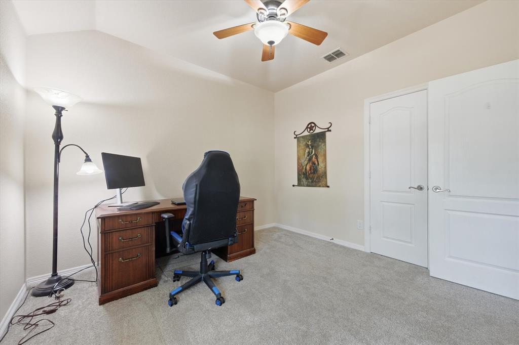 5992 Red Bud Road Fort Worth, TX 76135 - Photo 31 of 40 a view of a workspace with furniture and a window